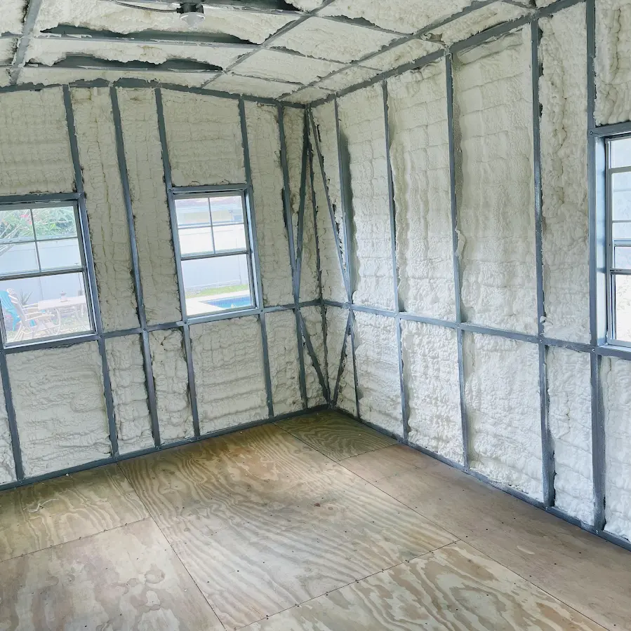 Closed-cell spray foam insulation applied to wall cavities in a residential project in Gulf Breeze